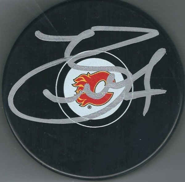 Autographed T.J. BRODIE Calgary Flames Hockey Puck