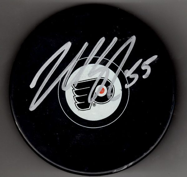 Autographed NICK SCHULTZ Philadelphia Flyers Hockey Puck