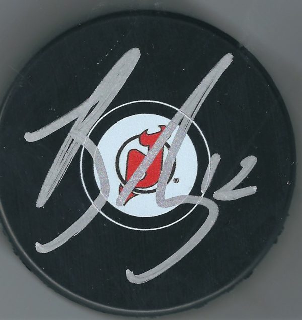 Autographed BEN LOVEJOY New Jersey Devils Hockey Puck