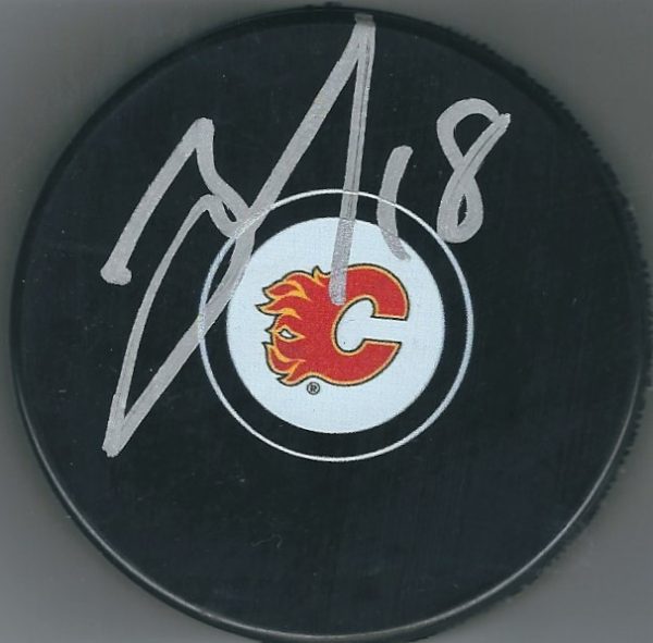 Autographed JAMES NEAL Calgary Flames Hockey Puck