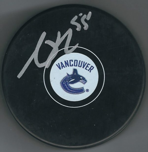 Autographed ALEX BIEGA Vancouver Canucks Hockey Puck