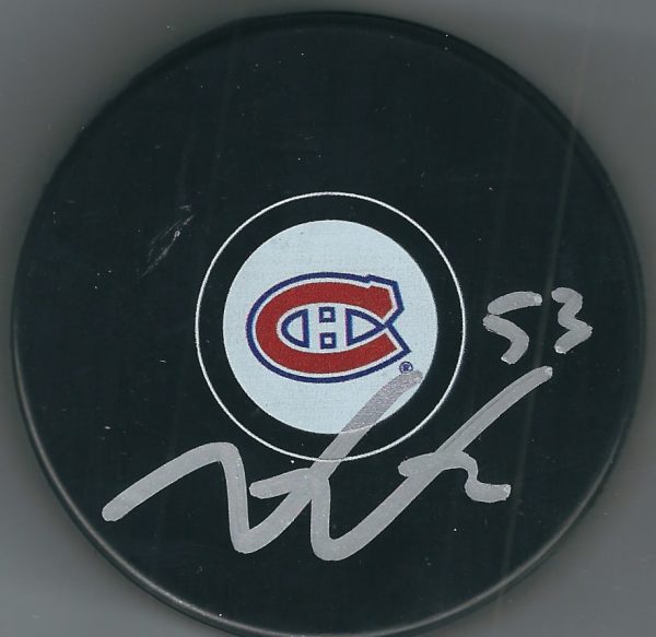 Autographed VICTOR METE Montreal Canadiens Hockey Puck