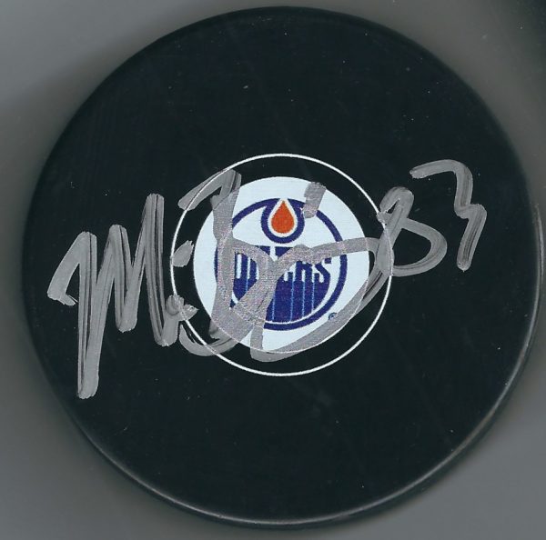 Autographed MATT BENNING Edmonton Oilers Hockey Puck