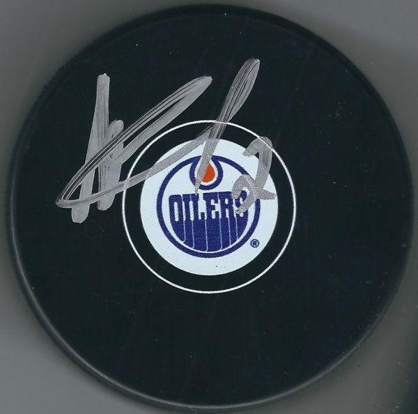 Autographed ANDREJ SEKERA Edmonton Oilers Hockey Puck