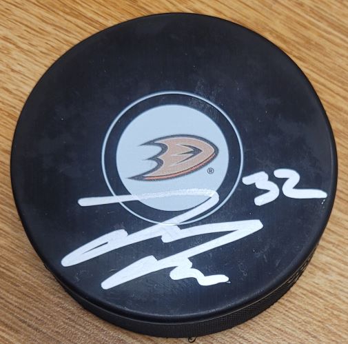 Autographed JACOB LARSSON Anaheim Ducks Hockey Puck - Main Line Autographs