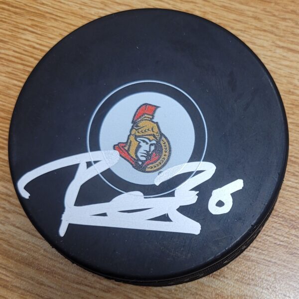 Autographed ERIK BRANNSTROM Ottawa Senators Hockey Puck