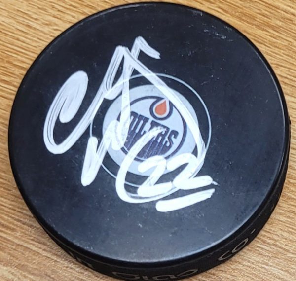 Autographed CHARLIE HUDDY Edmonton Oilers Hockey Puck